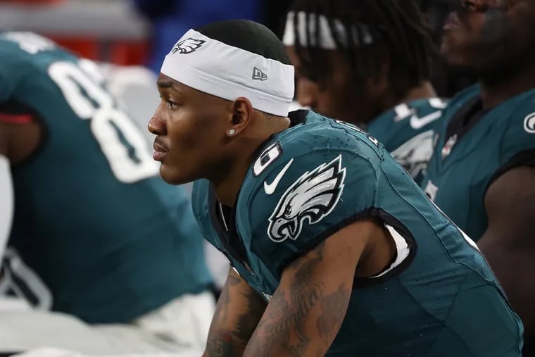 Eagles wide receiver DeVonta Smith sits on the bench late in the 33-13 loss to the Cowboys.