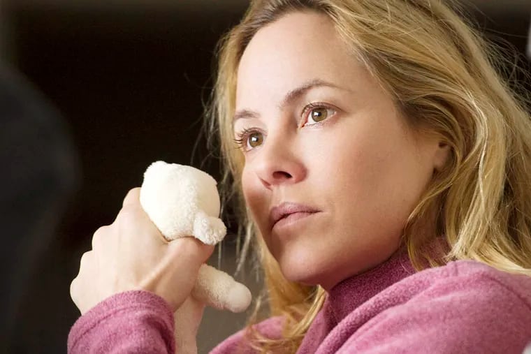 This image released by Warner Bros. Pictures shows Maria Bello in a scene from "Prisoners." (AP Photo/Warner Bros. Pictures, Wilson Webb)