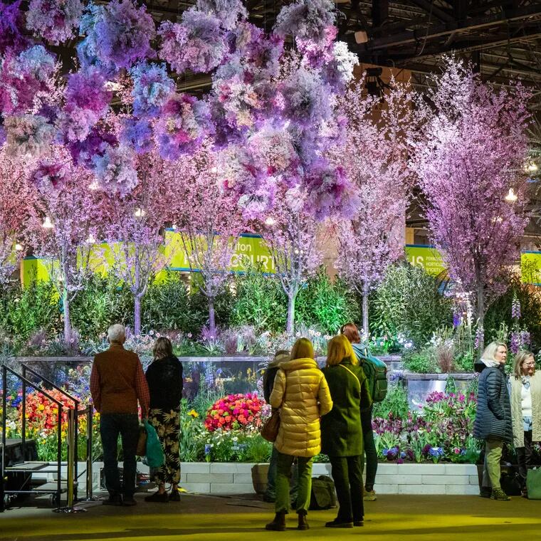 Visitors at the “Edges and Reflections” entrance garden at the annual Pennsylvania Horticultural Society (PHS) Philadelphia Flower Show at the Pennsylvania Convention Center, in Philadelphia, Friday, March 1, 2024.