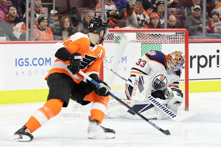 Edmonton Oilers goalie Cam Talbot stops Flyers center Sean Couturier on Feb. 2. The Flyers acquired Talbot early Saturday morning.
