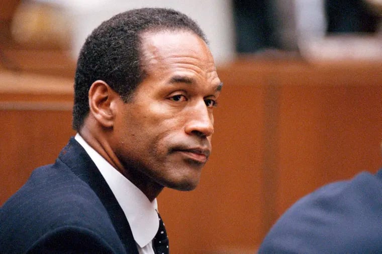 NFL legend O.J. Simpson sits at his arraignment in Superior Court in Los Angeles on July 22, 1994, where he pleaded "absolutely, 100 percent not guilty" on murder charges. Simpson, the decorated football superstar and Hollywood actor who was acquitted of charges he killed his former wife and her friend but later found liable in a separate civil trial, died Wednesday of prostate cancer. He was 76.