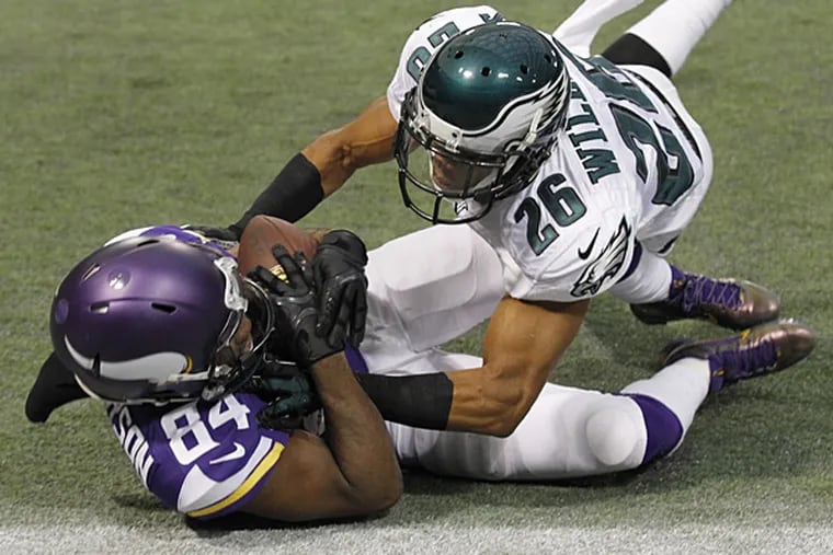 Vikings wide receiver Cordarrelle Patterson catches a five-yard touchdown pass in front of Eagles cornerback Cary Williams during the second half. (Ann Heisenfelt/AP)