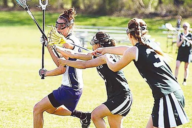 Phoenixville’s Liz Jones (left), on her way to score a goal vs. Methacton, started on defense but blossomed as a shooter.