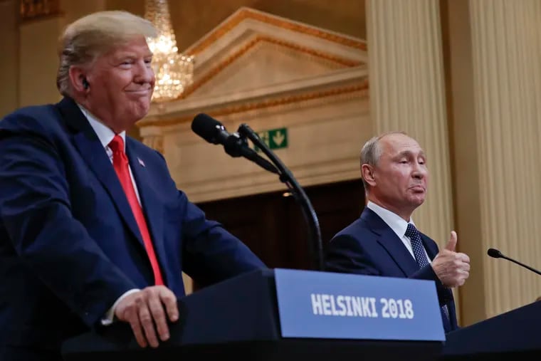 Russian President Vladimir Putin and then-President Donald Trump in Helsinki in 2018. Putin has played Trump for a fool, writes Trudy Rubin, and the Russian dictator is likely delighted at a prospective U.S. aid cutoff for Ukraine.