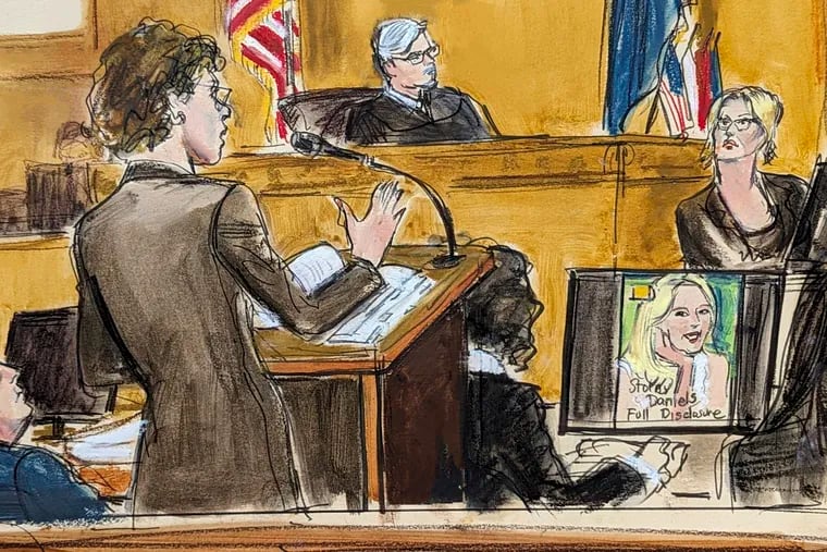 In this courtroom sketch, defense attorney Susan Necheles, center, cross examines Stormy Daniels, far right, whose real name is Stephanie Clifford, as former President Donald Trump, left, looks on with Judge Juan Merchan presiding during Trump's trial in Manhattan criminal court on Tuesday in New York.