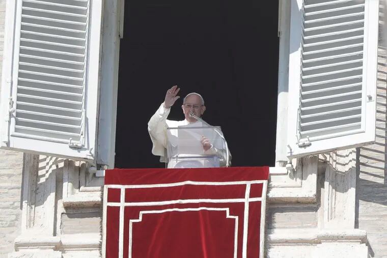 Pope Francis delivers his blessing during the Angelus noon prayer In St. Peter's Square at the Vatican, Sunday, Feb. 17, 2019. (AP Photo/Gregorio Borgia)