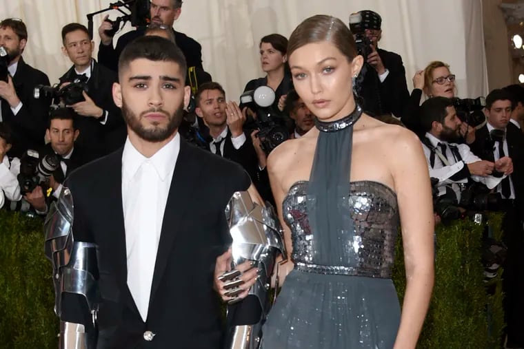 In this May 2, 2016 file photo, Zayn Malik, left, and Gigi Hadid arrive at The Metropolitan Museum of Art Costume Institute Benefit Gala in New York. Malik pleaded no contest to harassment at the family's Bucks County home.