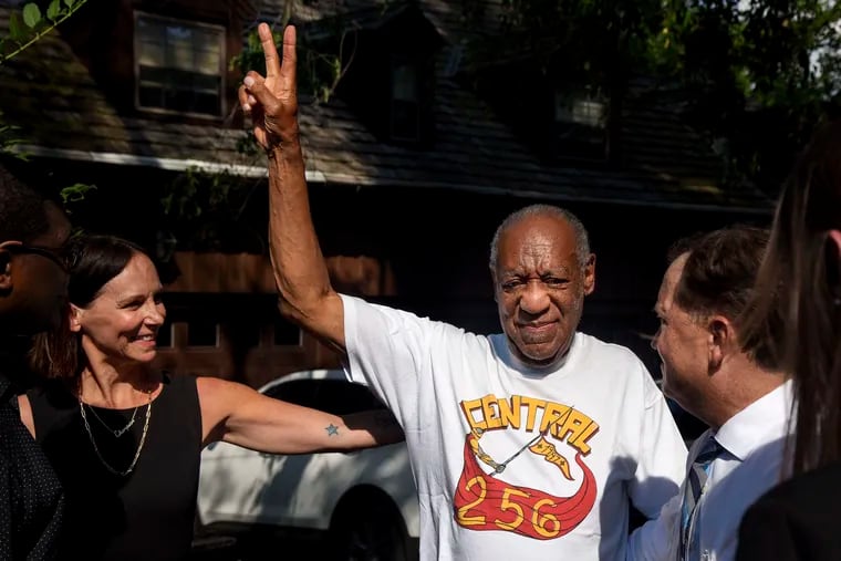 Bill Cosby, accompanied by his attorneys and other aides, makes his first public appearance at his home in Elkins Park after being released from prison on Wednesday.