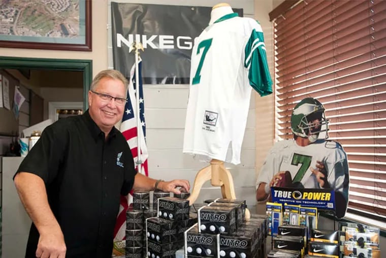 Ron Jaworski shows off his football memorabilia and golf accessories at Valleybrook Country Club in Blackwood. He owns five golf courses in the region and got into the golf business as a backup plan. (Ron Tarver / Staff Photographer)