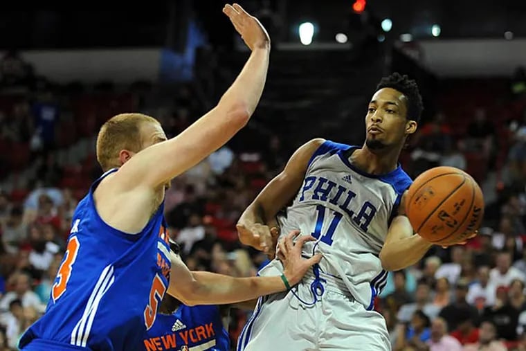 Philadelphia 76ers guard J.P. Tokoto (11) looks to pass the ball during an NBA Summer League game against the Knicks at Thomas & Mack Center. (Stephen R. Sylvanie/USA Today)