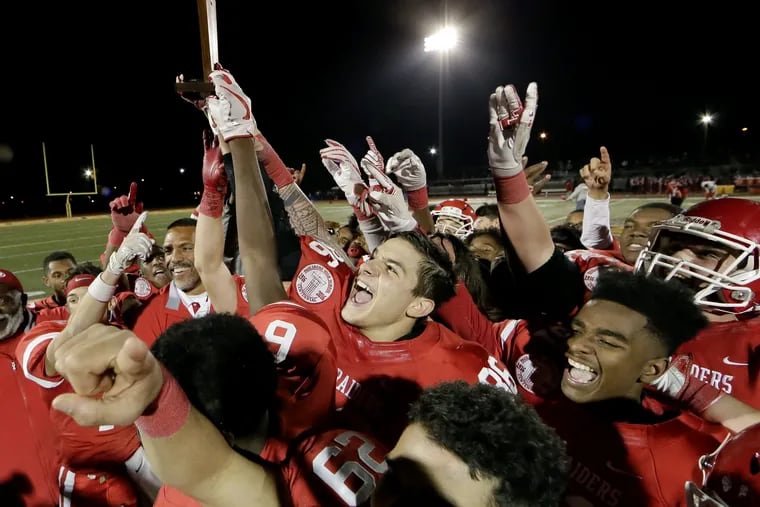 Paulsboro players celebrates after beating Penns Grove 34-24 in last year's South Jersey Group 1 final at Rowan University.