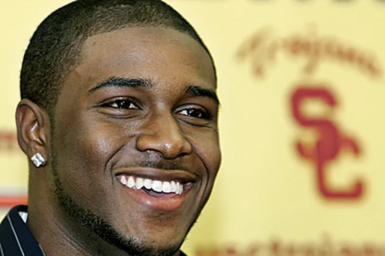 Former USC star Reggie Bush won the Heisman Trophy in 2004 after having 2,218 yards from scrimmage. (AP Photo/Reed Saxon, File)