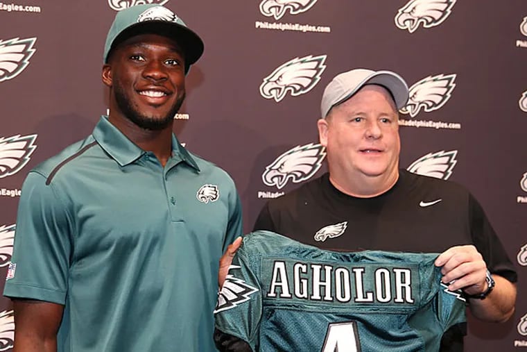 Nelson Agholor poses with coach Chip Kelly. (David Maialetti/Staff Photographer)