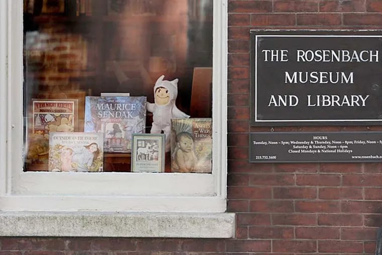 Sendak books and other items for sale displayed in the window of the Rosenbach Museum. (David M. Warren/Staff Photographer)