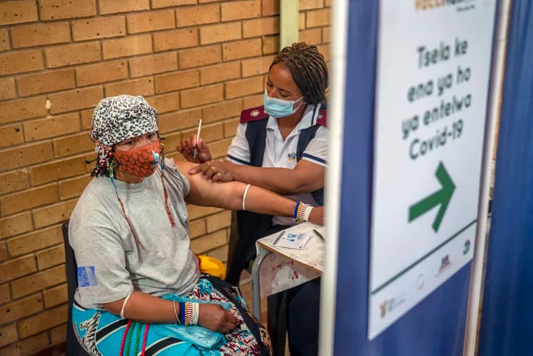 An Orange Farm, South Africa, resident receives her vaccine against COVID-19.