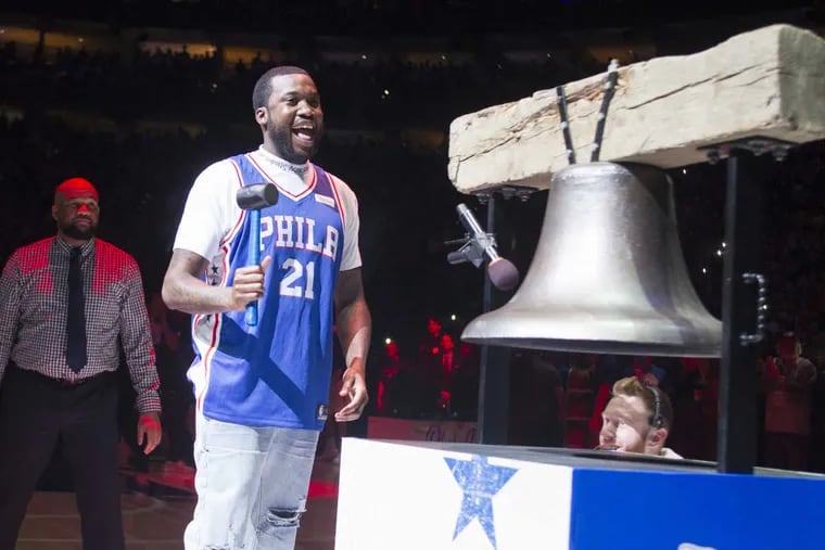 Rapper Meek Mill rings the Liberty Bell replica before the playoff game between the Sixers and the Miami Heat at the Wells Fargo Center on April 24, 2018.