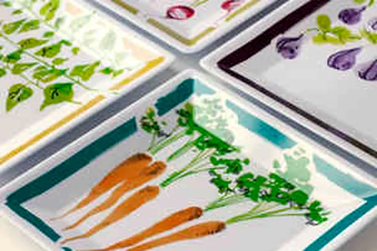 Retro-inspired fruit and vegetable graphics on these 8-inch plastic salad plates are designed to add zest to picnics. From the late Ben Morris of Savannah College of Art and Design, the Ben Collection plates are dishwasher-safe, but not for the microwave.