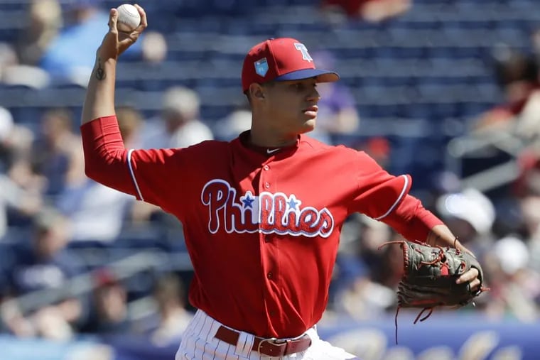Phillies pitcher Yacksel Rios throws the baseball during a spring training game against the Minnesota Twins at Spectrum Field in Clearwater, FL on Monday, March 5, 2018.