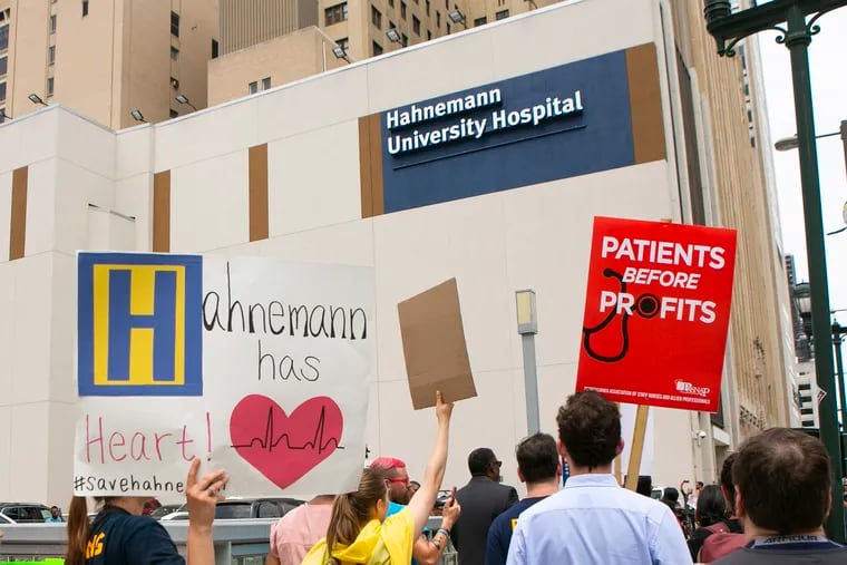 A large crowd of people rallied outside of Hahnemann University Hospital to save it from closure on Thursday, July 11, 2019. It was announced last month that the hospital would be closing.