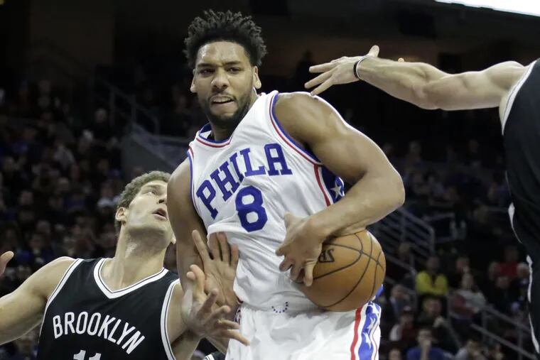 Sixers' Jahlil Okafor didn't score any points against the Nets on Sunday, but made up for it with 11 rebounds.