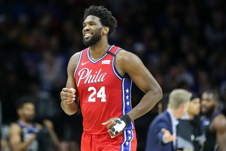 The Sixers' Joel Embiid wears padding to protect his injured left ring finger, which required surgery and sidelined him for nine games before his return Tuesday night against the Golden State Warriors.