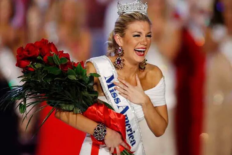 FILE - In this Jan. 12, 2013 file photo, Miss New York Mallory Hytes Hagan reacts as she is crowned Miss America 2013 in Las Vegas. Gov. Chris Christie's spokesman Michael Drewniak on Wednesday night, Feb. 13, 2013  confirmed news of the Miss America pageant's return to Atlantic City.  Lt. Gov. Kim Guadagno is scheduled make a formal announcement Thursday on Atlantic City's Boardwalk Hall. (AP Photo/Isaac Brekken, File)