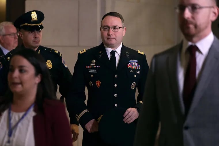 Army Lt. Colonel Alexander Vindman, Director for European Affairs at the National Security Council, arrives at a closed session before the House Intelligence, Foreign Affairs and Oversight committees on Tuesday at the U.S. Capitol in Washington, D.C.