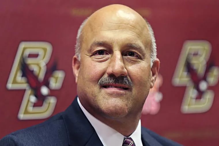 Steve Addazio smiles during a news conference where he was introduced as the new football head coach for Boston College in Boston, Wednesday, Dec. 5, 2012. Addazio, a Connecticut native, was hired to replace Frank Spaziani. He takes over a program that finished last in the Atlantic Coast Conference last season. (AP Photo/Charles Krupa)