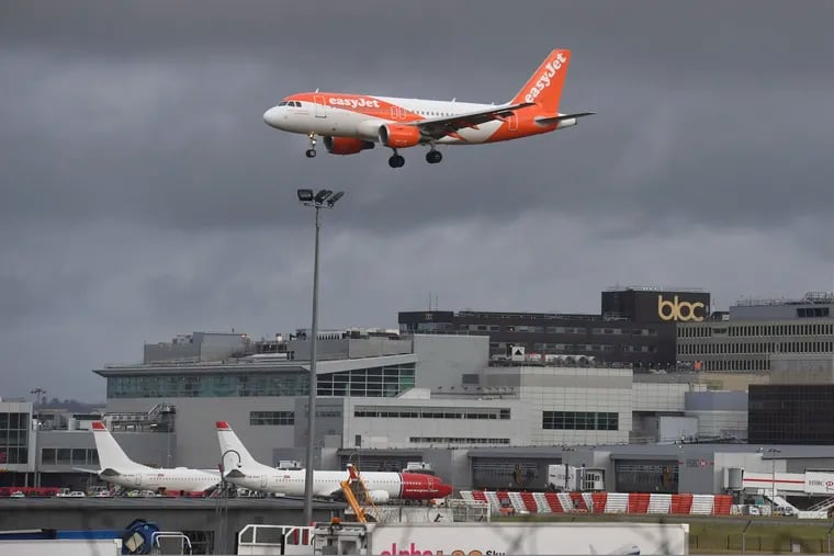 An EasyJet plane on its final approach before landing at Gatwick airport near London, Friday Dec. 21, 2018. Flights resumed at London's Gatwick Airport on Friday morning after drones sparked the shutdown of the airfield for more than 24 hours, leaving tens of thousands of passengers stranded or delayed during the busy holiday season.
