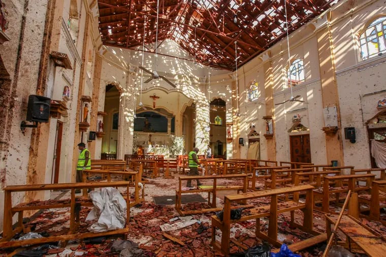 A view of St. Sebastian's Church damaged in blast in Negombo, north of Colombo, Sri Lanka, Sunday, April 21, 2019.  More than hundred were killed and hundreds more hospitalized with injuries from eight blasts that rocked churches and hotels in and just outside of Sri Lanka's capital on Easter Sunday, officials said, the worst violence to hit the South Asian country since its civil war ended a decade ago. (AP Photo/Chamila Karunarathne)