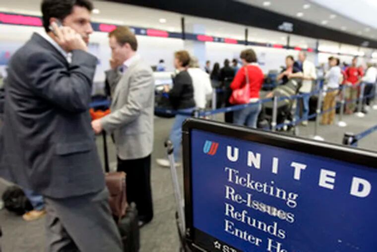 Passengers check in for United Airlines flights in San Francisco. The airline is the nation&#0039;s second-largest.