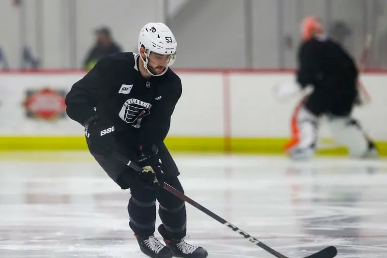 Flyers defenseman Shayne Gostisbehere skated with the puck during practice earlier this month in Voorhees.