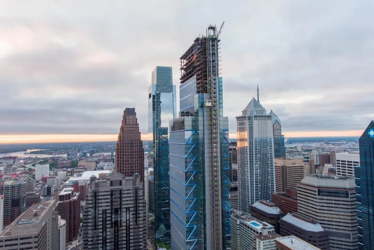 A high-elevation drone photo of the Comcast Center and the new Comcast tower under construction.