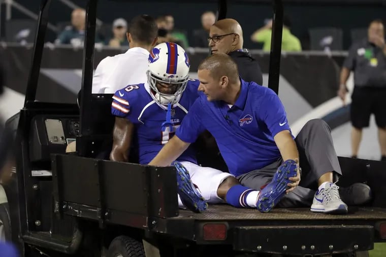 Bills Rod Streater is helped off the field during the second half of an NFL preseason football game against the Eagles on Thursday.