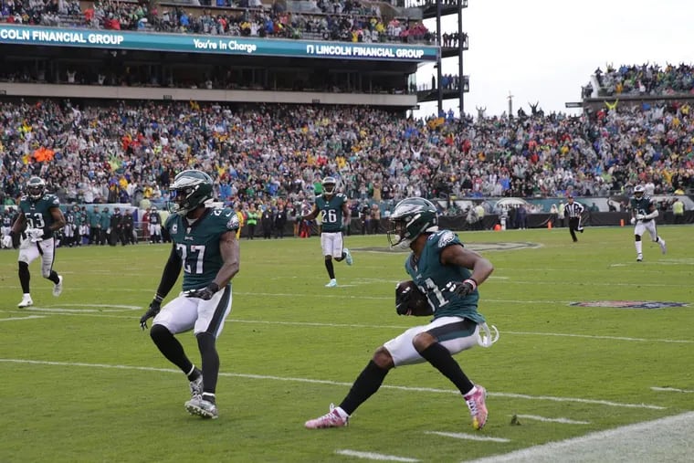 Eagles’ cornerback Jalen Mills returns an interception for a touchdown against the 49ers.