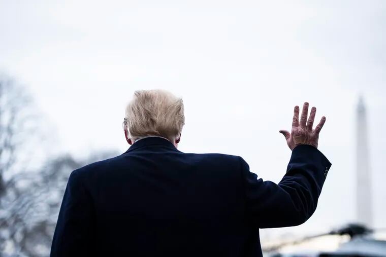President Donald Trump is pictured above walking to Marine One in January.