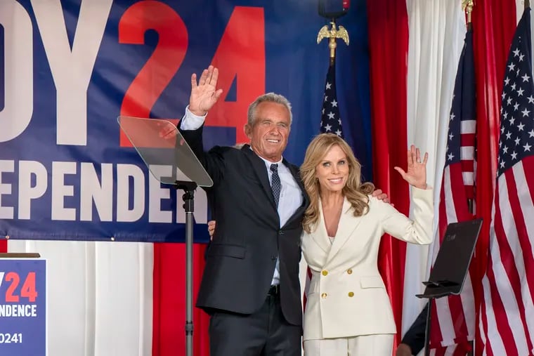Robert F. Kennedy Jr. and his wife Cheryl Hines on stage at the National Constitution Center on Independence Mall on Monday, after he announced he will drop his Democratic primary bid and launch an independent party run for the presidency in 2024.
