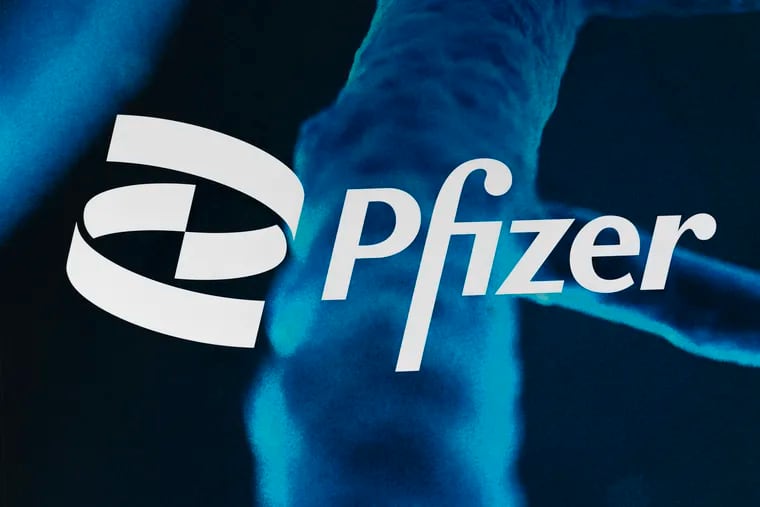 The Pfizer logo is displayed at the company's headquarters in New York.