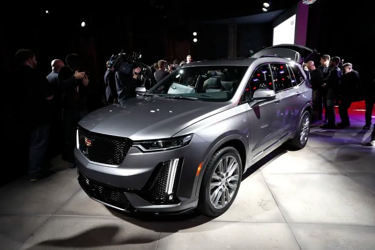 The three-row Cadillac XT6 crossover SUV is unveiled during media previews for the North American International Auto Show in Detroit, Sunday, Jan. 13, 2019. (AP Photo/Paul Sancya)