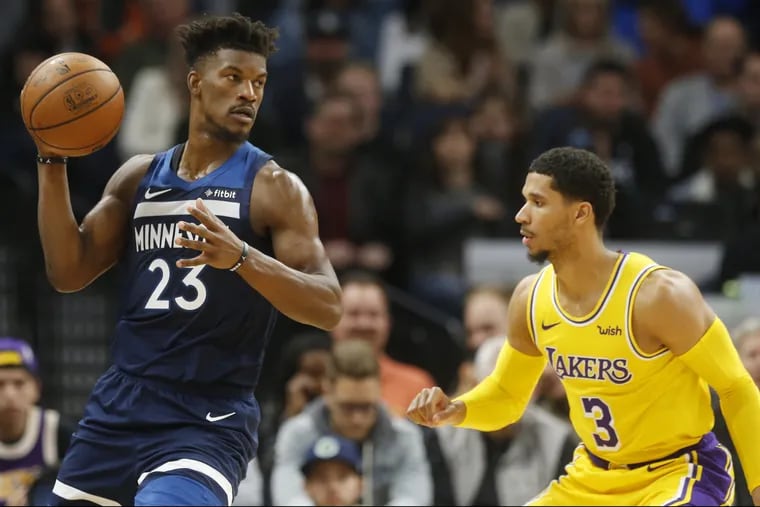 The acquisition of Jimmy Butler, left, has sliced the Sixers odds of winning the NBA title more than half in some sportsbooks,
