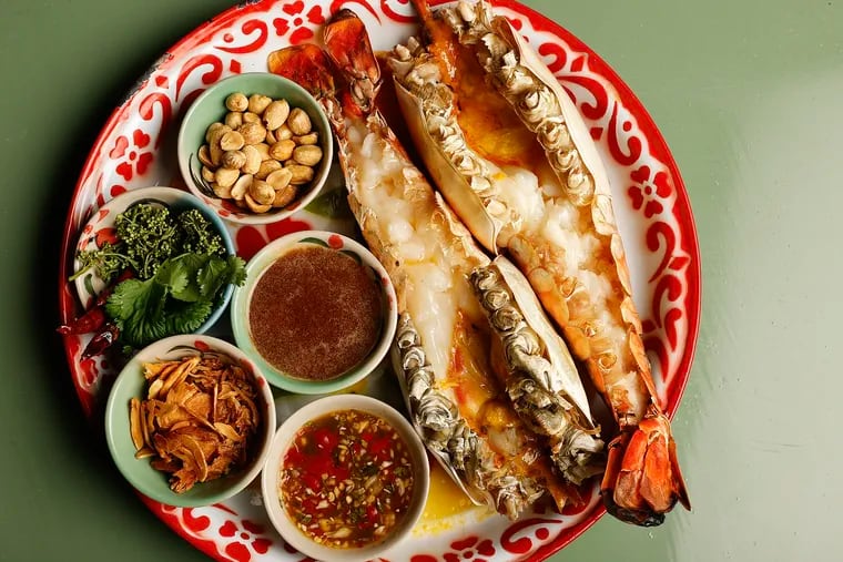The goong phao, whole grilled freshwater river prawn with nam pla waan, neem, fried shallots, garlic and peanuts from Kalaya in Fishtown on Friday, January 20, 2023.