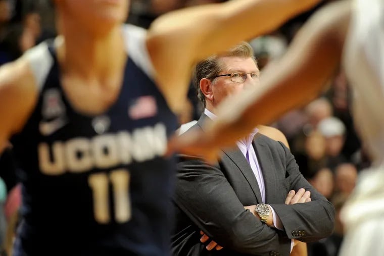 Coach Geno Auriemma is courtside Sunday, February 14, 2016 as his number one ranked Connecticut women's team beats Temple 85-60 for the Huskies’ 61st straight victory. TOM GRALISH / Staff Photographer