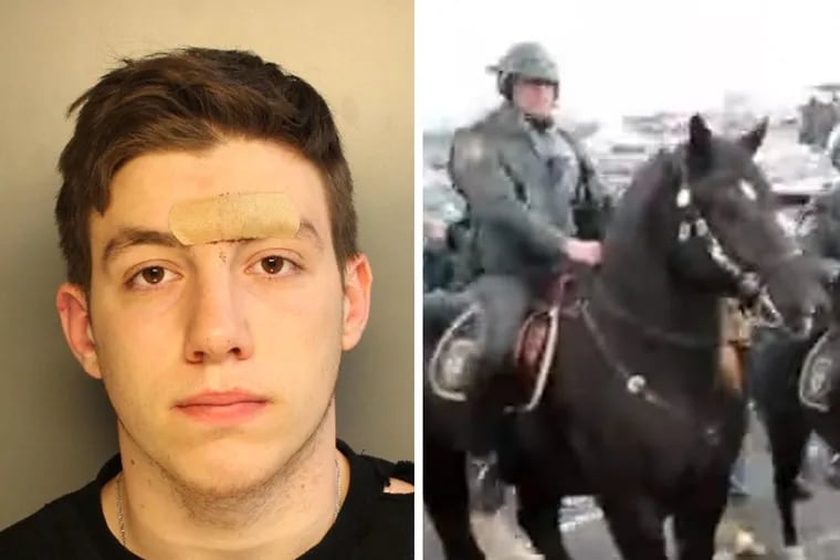 Andrew Tornetta (left) was arrested by police after allegedly punching a mounted officer’s police horse outside Lincoln Financial Field prior to the Eagles’ NFC Championship game against the Vikings.