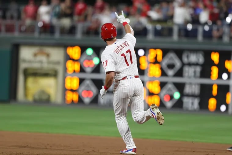 Rhys Hoskins of the Phillies celebrates his 5th inning home run as he rounds the bases against the Red Sox at Citizens Bank Park on August 14, 2018.