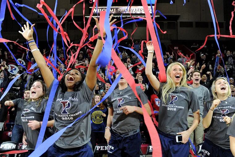 Members of the Penn women's basketball team celebrate being in the NCAA tournament.