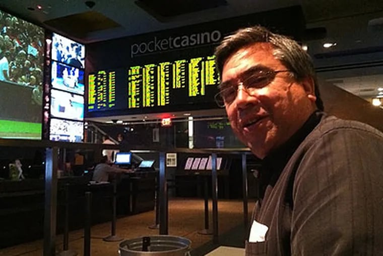 Chris Lindstrom, 48, of Sacramento, Ca., had a front row seat last week to watch the baseball playoffs at Lagasse's Stadium - the sports book at the Venetian Casino Resort in Las Vegas, Nev. He said he would visit Atlantic City if it had sports betting. (Suzette Parmley / Staff)