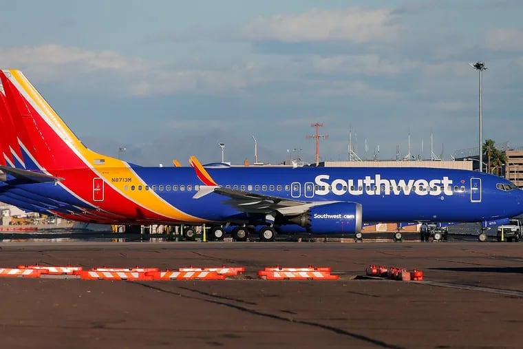 A group of Southwest Airlines Boeing 737 MAX 8 aircraft sit on the tarmac at Phoenix Sky Harbor International Airport on March 13, 2019 in Phoenix, Arizona. The United States has followed countries around the world and has grounded all Boeing 737 Max 8 aircraft following the crash of an Ethiopia Airlines 737 Max 8.  (Photo by Ralph Freso/Getty Images/TNS)