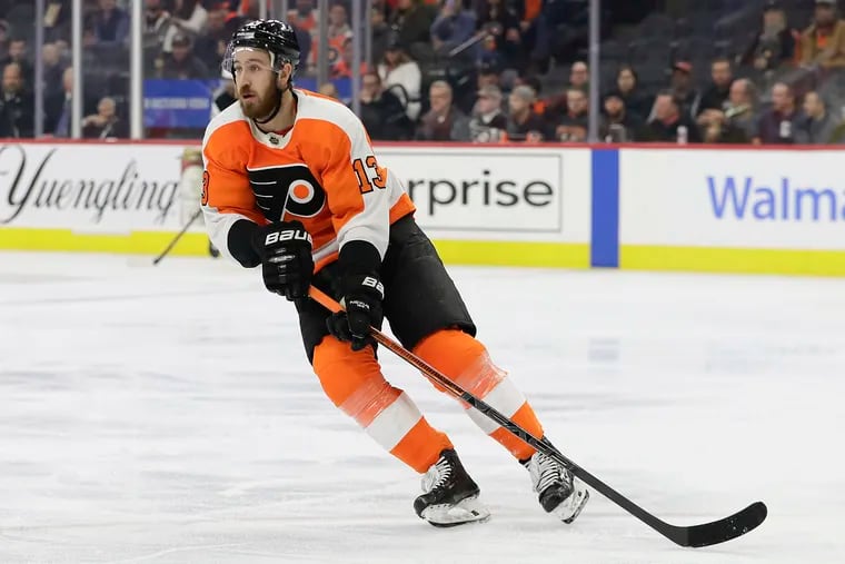 Flyers center Kevin Hayes, shown skating against the New Jersey Devils on Feb. 6, and the rest of the NHL are hoping to return to action soon.