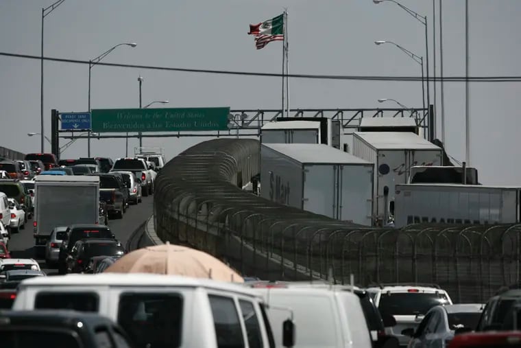 Trucks line up at the Mexican border to cross into the United States. While the president called off the tariffs against Mexico, there are long-lasting consequences of employing tariffs or tariff threats.
