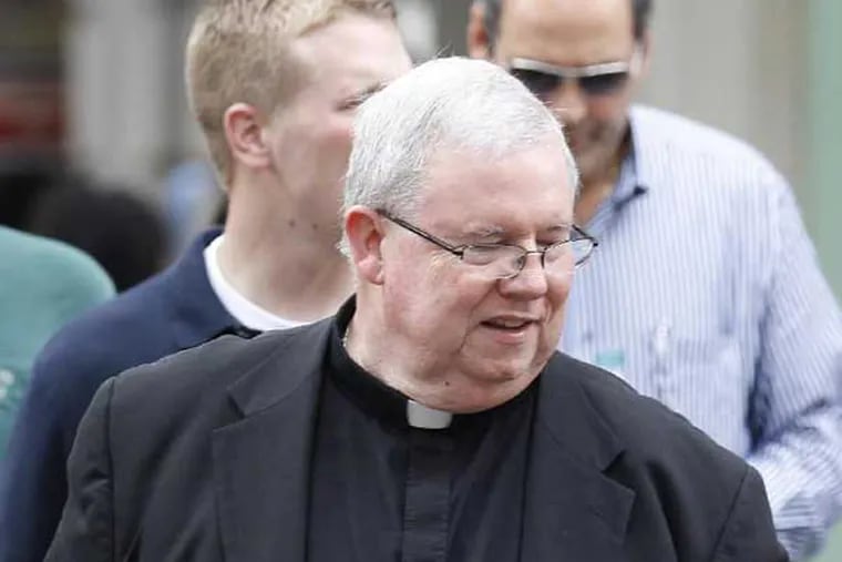 Msgr. William J. Lynn leaves the Criminal Justice Center after testifying in a sex-abuse trial on Wednesday, May 23, 2012. ( Yong Kim / Staff Photographer )
